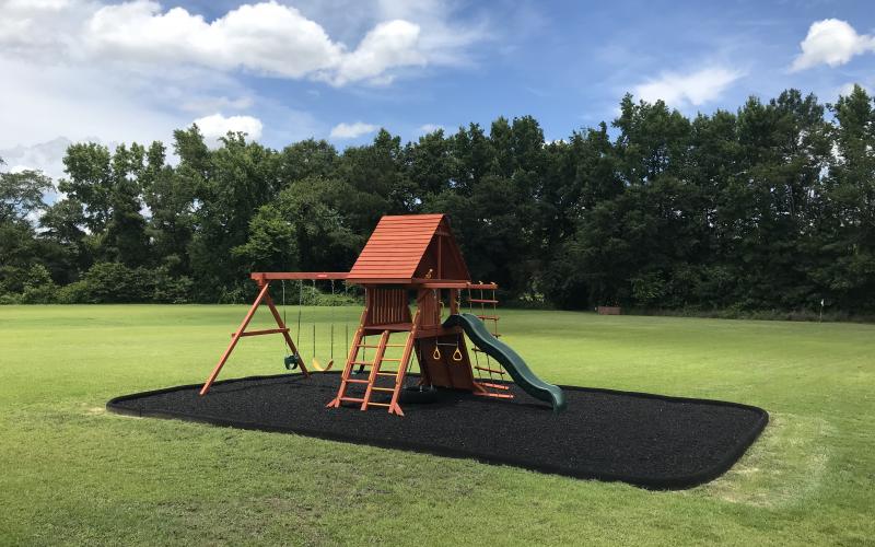 Amazing Playground with Rubber Mulch and Rubber Borders