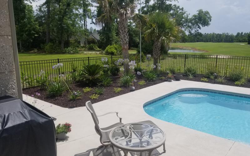 Pool Landscaping with Rubber Mulch Surround