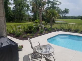 Pool Landscaping with Rubber Mulch Surround
