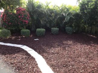Backyard Replaced Wood Mulch with Rubber Mulch